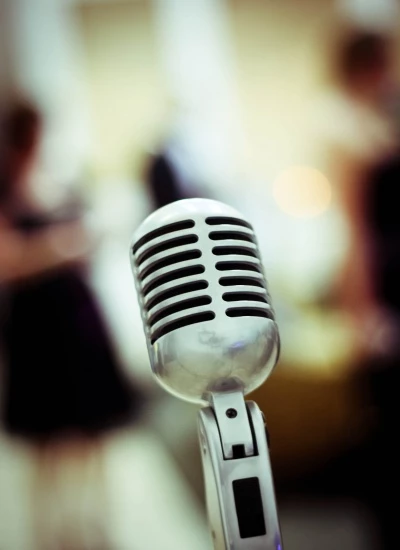 a vintage microphone waits for its performer photo by chloe lekeux  camera shy