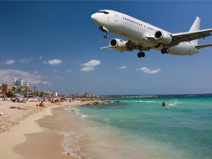 air airplane seaside beach seashore landing plane