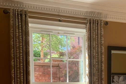 Eyelet curtains with green tree