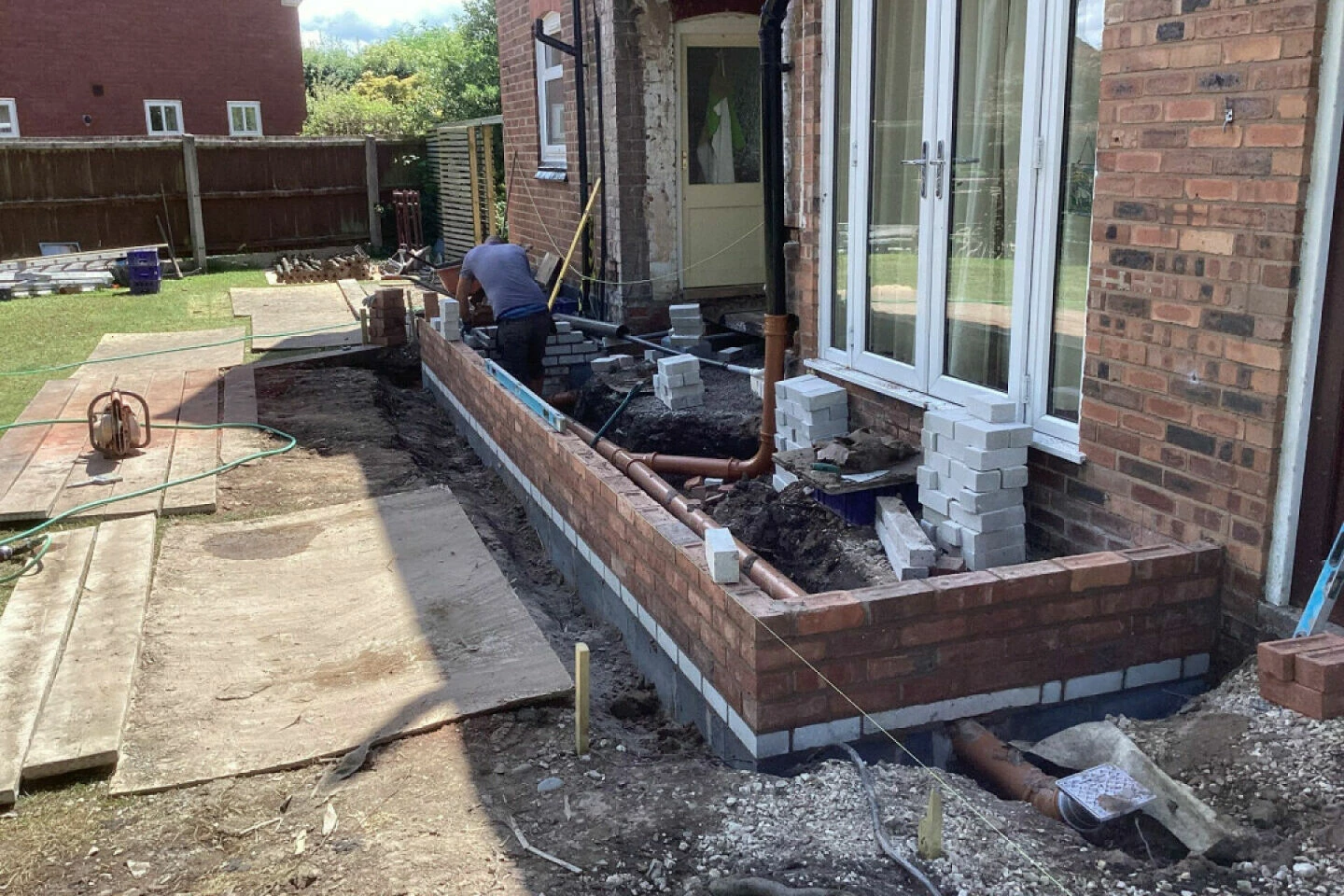 Home extension construction with brickwork and drainage installation by Nantwich Building Services in Cheshire