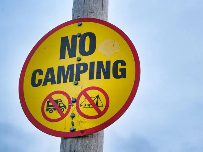 No camping traffic warning sign