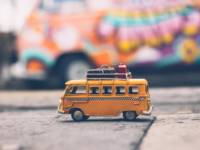 Selective Focus Photography of Yellow School Bus Die-cast