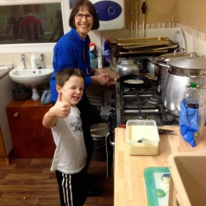 Helen and Lucas making pancakes