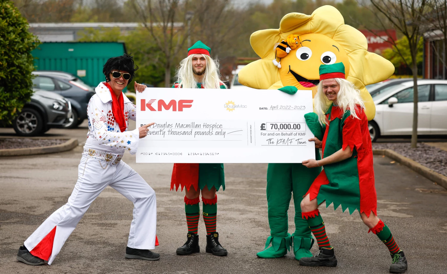 elvis with a cheque for dougie mac
