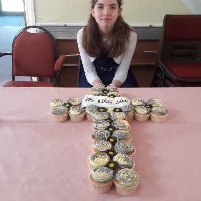 leah with confirmation cupcakes