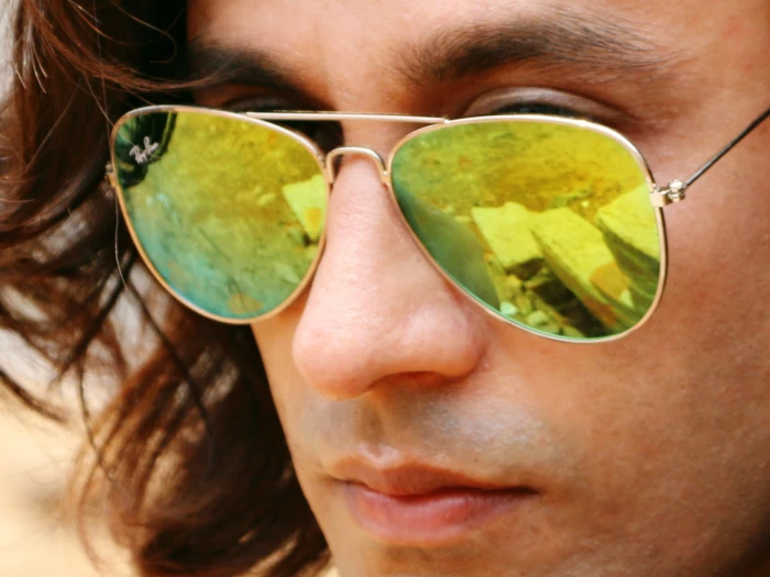 man wearing rayban sunglasses