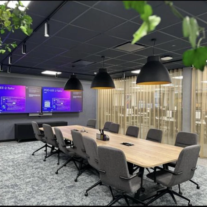 manchester company meeting room fitted out with computer screen displays