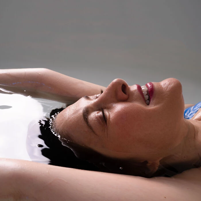 relaxing in a floatation pod