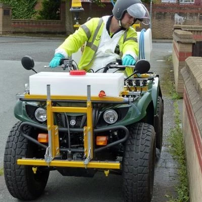 spraying weeds