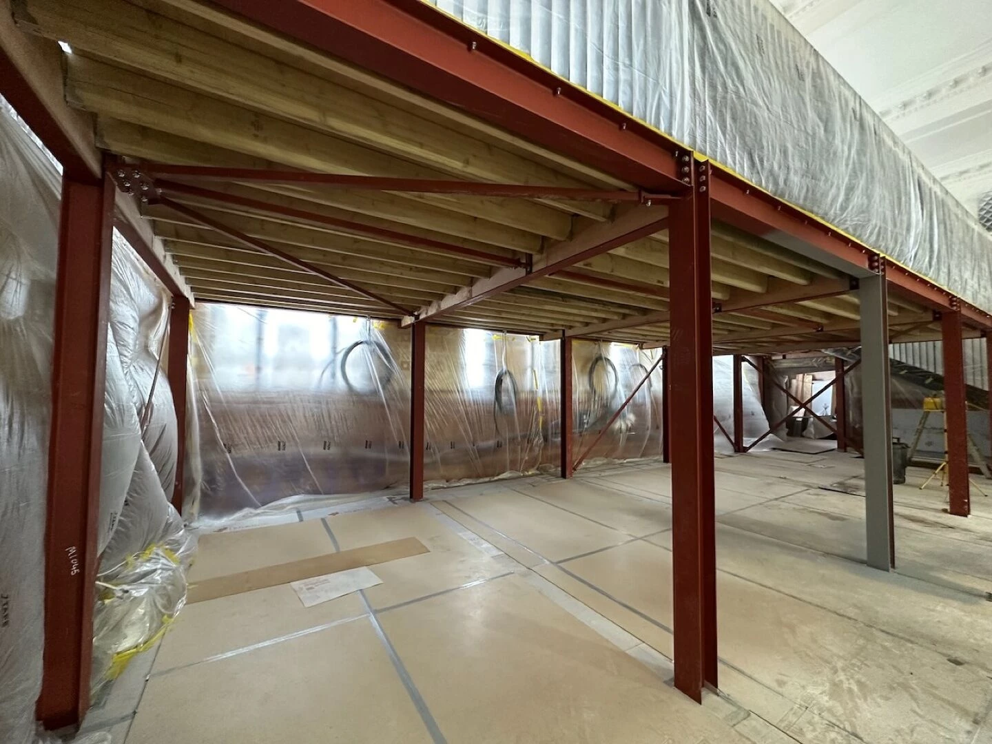 warehouse interior with red steel columns